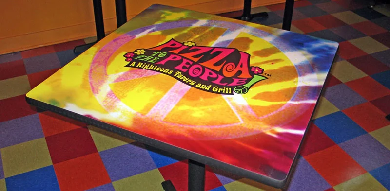Pizza Restaurant Logo Tables Installation