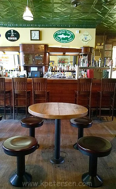 Wood Seat Bolt-Down Counter Stool Installation At Round Table